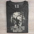 I Found Jesus Still Looking For Bigfoot T-Shirt Funny Sasquatch Merch Gift For Believers - Otakuforge