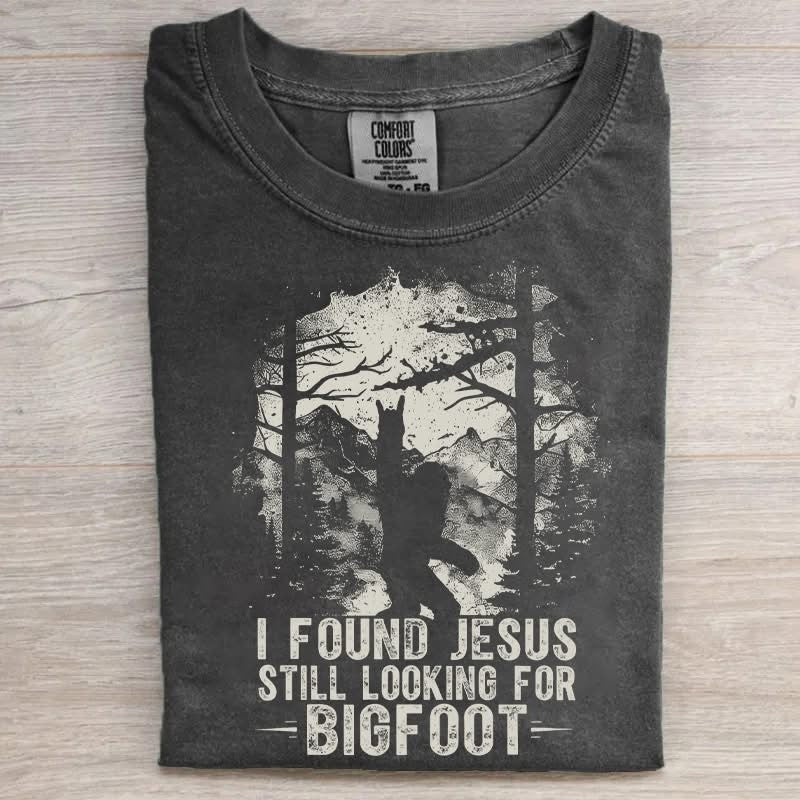 I Found Jesus Still Looking For Bigfoot T-Shirt Funny Sasquatch Merch Gift For Believers - Otakuforge